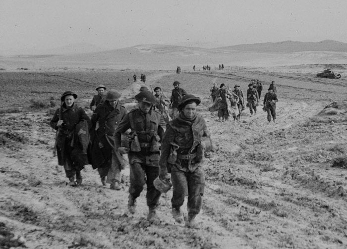 Troops from the Royal Inniskilling Fusiliers returning to the rear during the Battle for 'Two Tree' Hill,